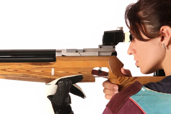 Vrouw die gericht zijn een pneumatische luchtgeweer — Stockfoto