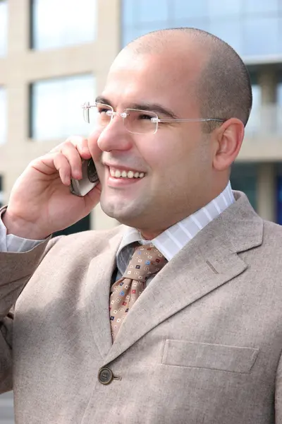 Uomo d'affari con cellulare — Foto Stock