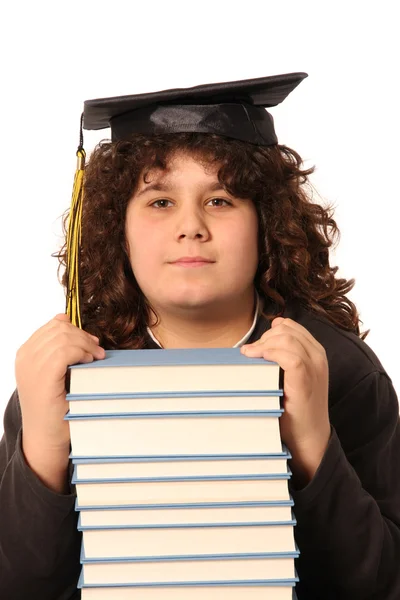 Мальчик и много книг — стоковое фото