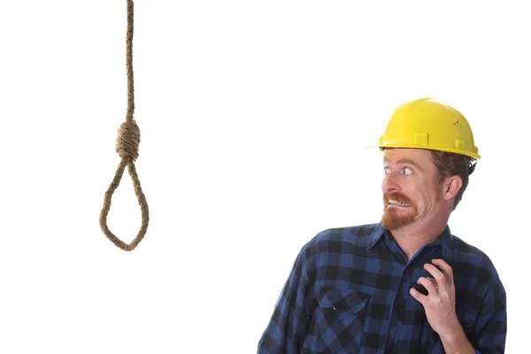 Worker looking at gallows — Stock Photo, Image
