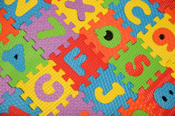 Ábécé puzzle háttér — Stock Fotó