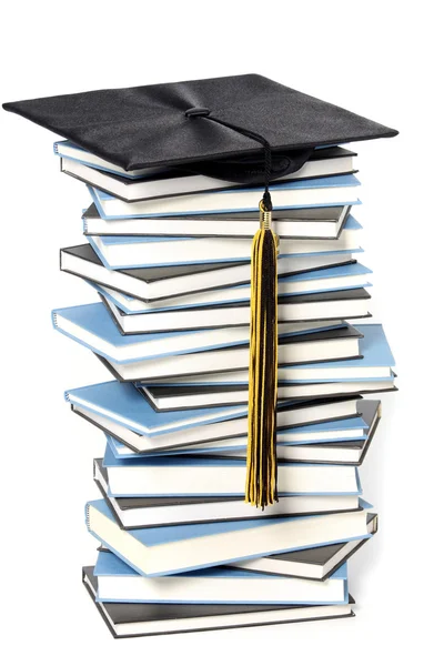 毕业帽和书籍 — 图库照片