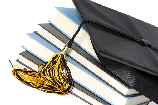 Graduation cap and books — Stock Photo, Image