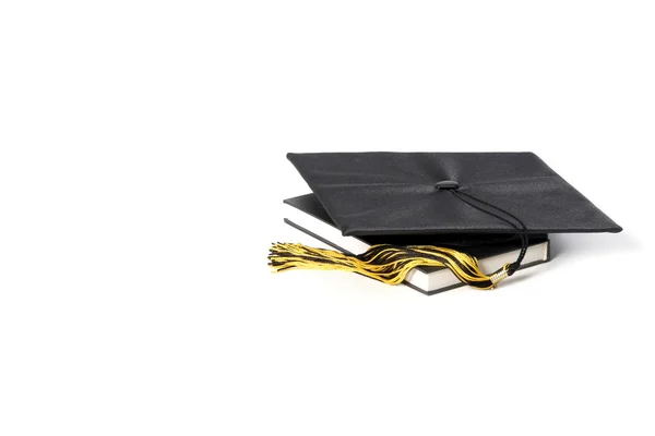 Graduation cap and books — Stock Photo, Image