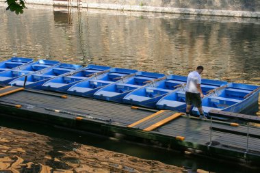 Prague, a boatman on the river Vltava clipart