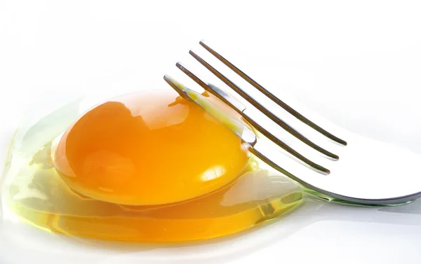 stock image Pricking the egg with a fork