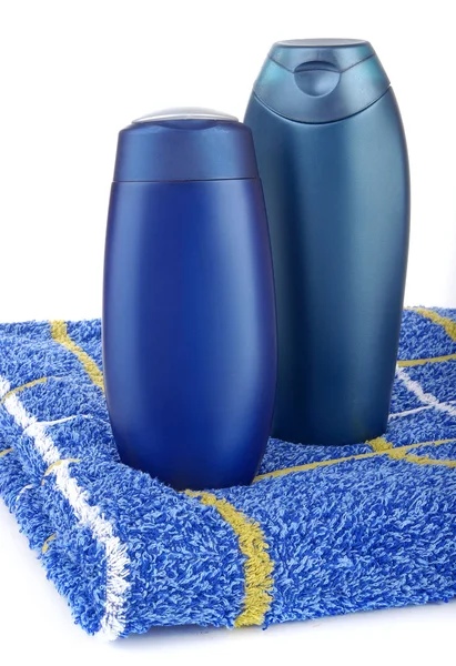 Dvě lahve a ručník — Stock fotografie