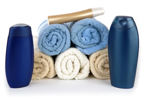 Plastik lahví a ručníky — Stock fotografie