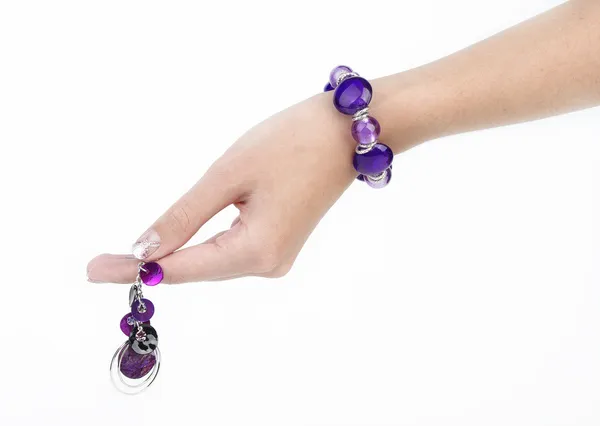 Purple bracelet and earring — Stock Photo, Image