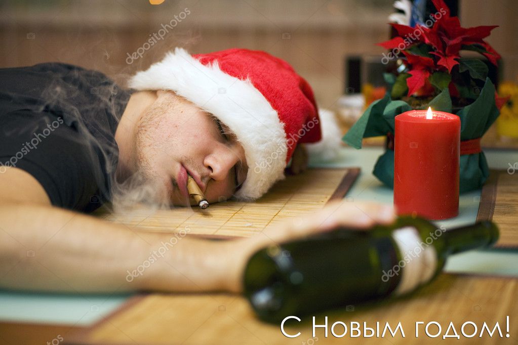 Drunk man in santas hat — Stock Photo © nikuwka #1680202