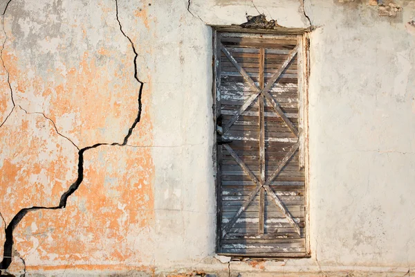 stock image Entrance to the grunge old house