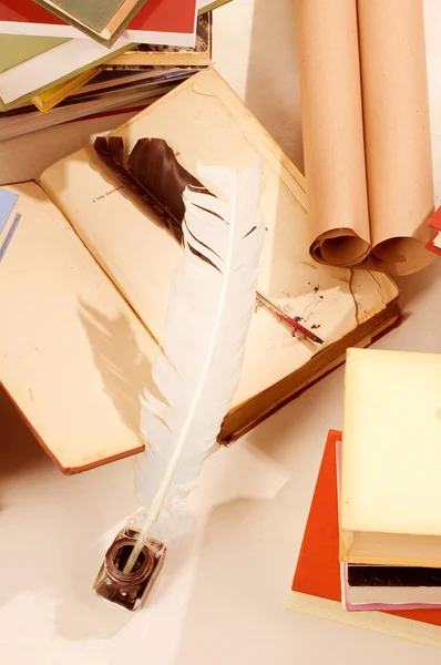 Books and quill and ink well — Stock Photo, Image