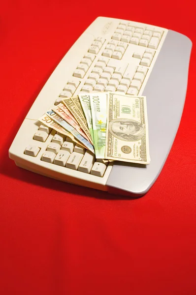Tastatur und Geld — Stockfoto