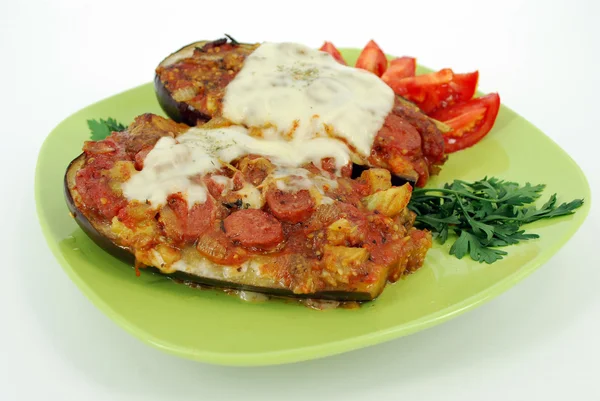 Baked aubergine with sausage and cheese — Stock Photo, Image