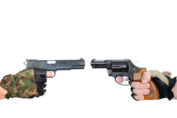 Hands with revolver and pistol — Stock Photo, Image