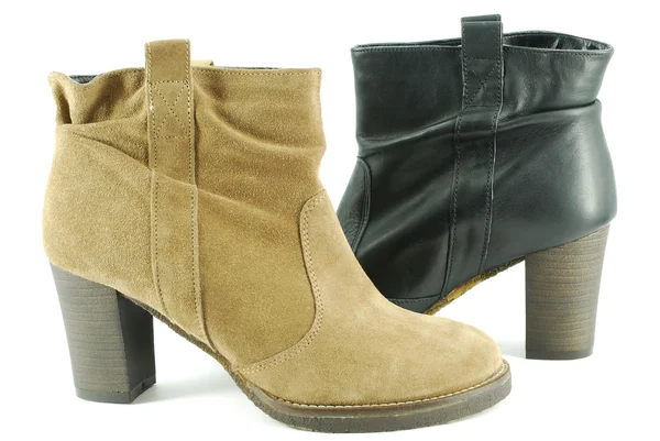 Vrouw bruine en zwarte laarzen — Stockfoto