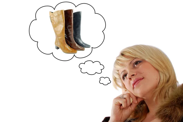 Skönhet kvinna tänka på nya moderna boot — Stockfoto