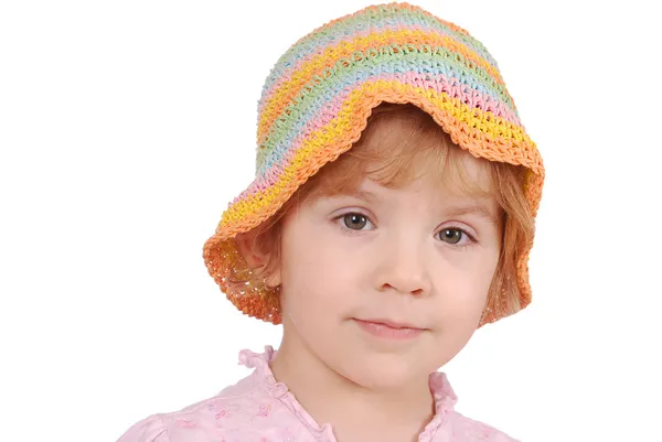 Kleines Mädchen mit buntem Hut — Stockfoto