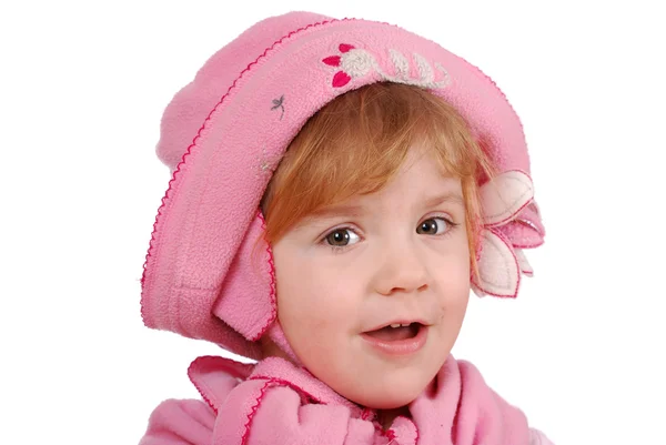 Liten flicka med rosa mössa och halsduk — Stockfoto