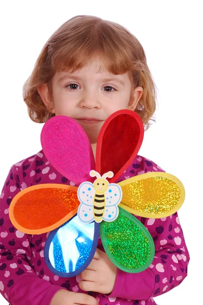 Liten flicka med leksak — Stockfoto