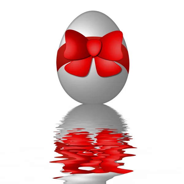 Huevo de Pascua con cinta roja —  Fotos de Stock