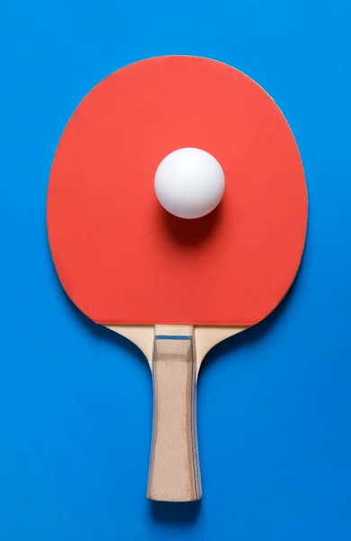 Ping-pong pagaia e palla Fotografia Stock