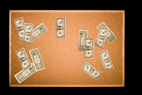 Muitas notas de um dólar na placa de cortiça — Fotografia de Stock