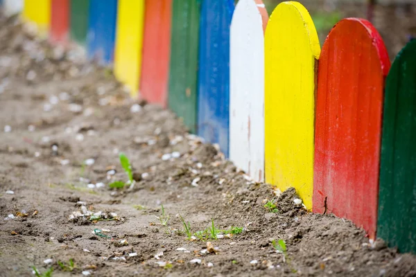 Colorful wooden fence — Stock Photo, Image