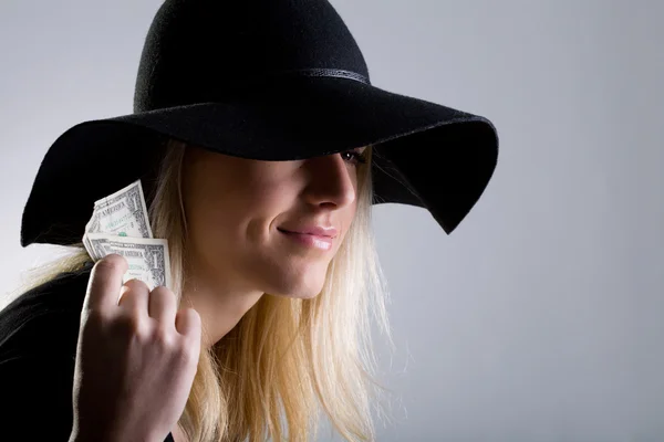 Businesswoman holding dollars — Stock Photo, Image