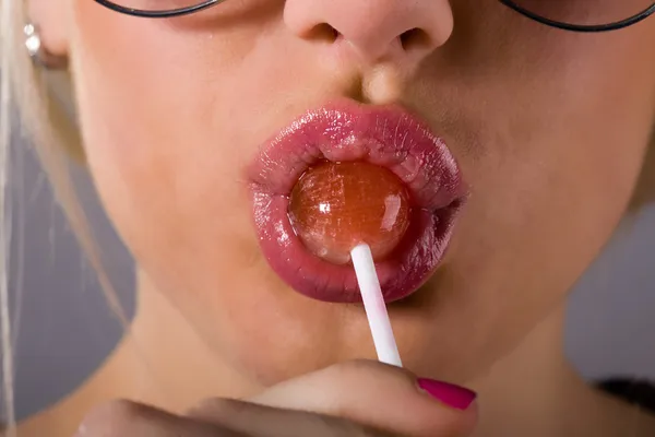 Lollipop and sexy mouth — Stock Photo, Image