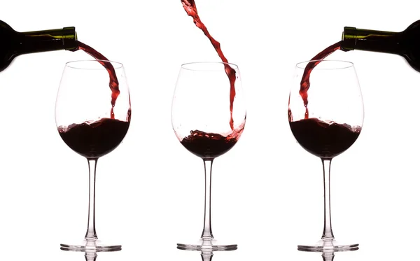 Gieten en spatten wijn — Stockfoto