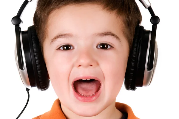 Niño con auriculares — Foto de Stock