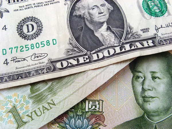 stock image One dollar and one yuan