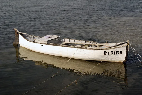 stock image Empty abandoned boat in the sea