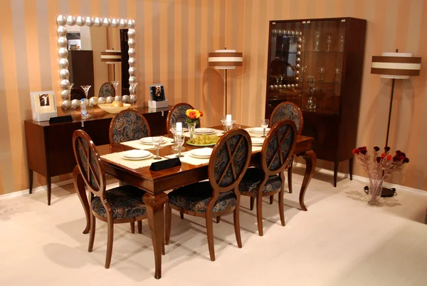 stock image A beautiful dinning room with brown furn