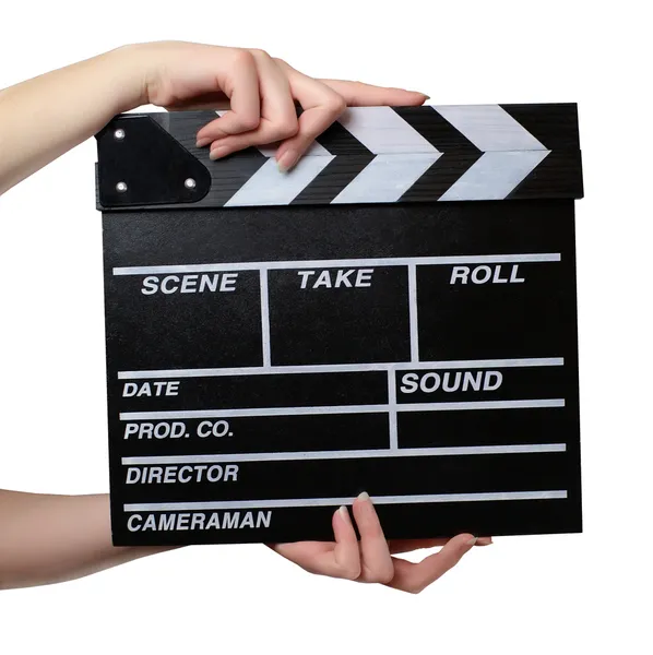 Hands with a movie clapper board close — Stok fotoğraf