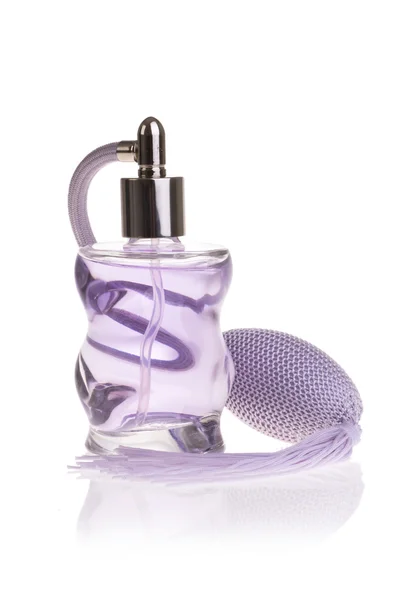 Parfümflasche aus lila Glas — Stockfoto