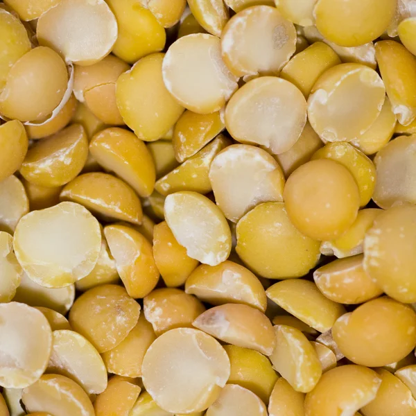 背景として黄色のエンドウ豆 — ストック写真