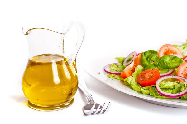 Salad and oil Stock Image