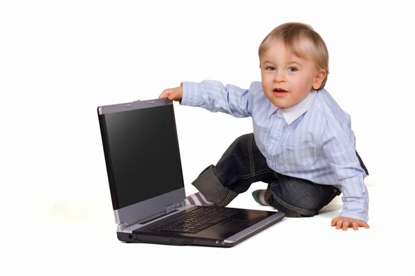 stock image Young boy with laptop