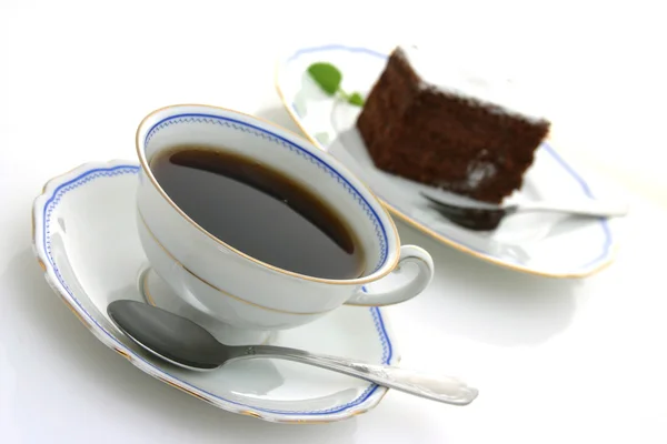 Tasse de café et gâteau au chocolat — Photo