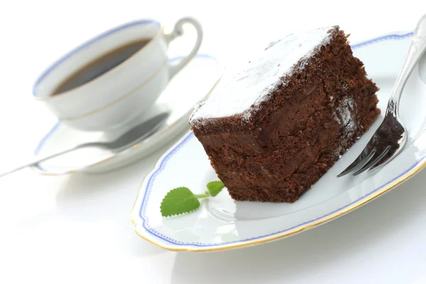 Чашка кави та шоколадного торта — стокове фото