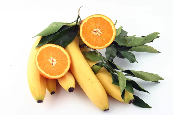 Bananas and orange — Stock Photo, Image