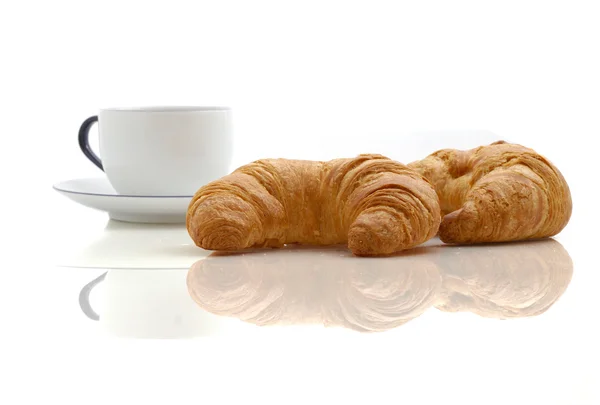 Croissant, šálek kávy — Stock fotografie