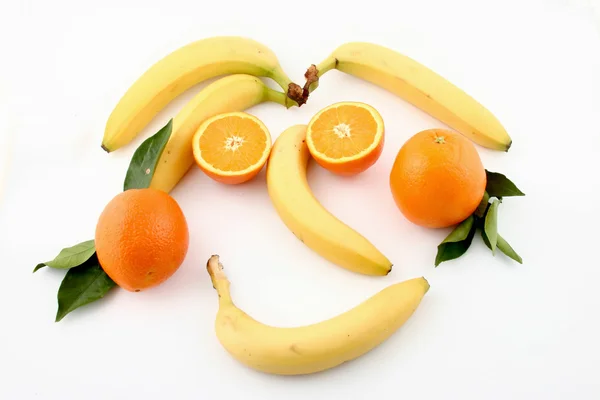 Banány a pomeranče Royalty Free Stock Obrázky