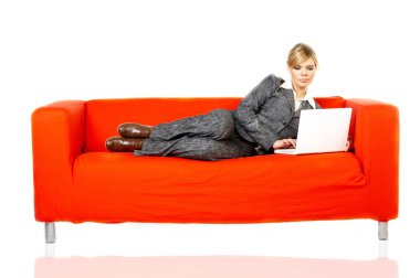 Woman on red couch clipart