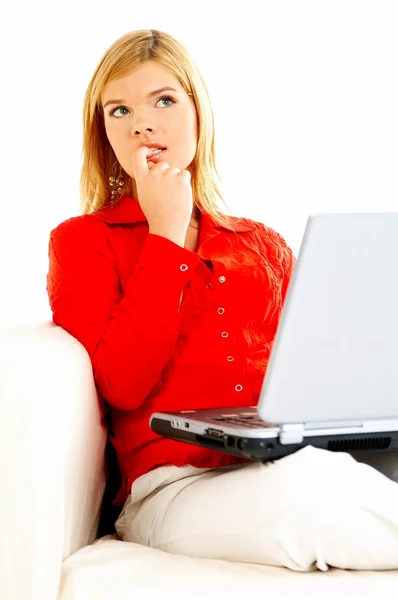 Women with laptop on couch — Stock Photo, Image