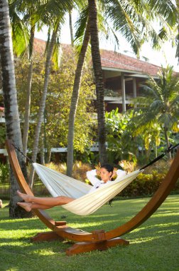 Woman on hammock clipart