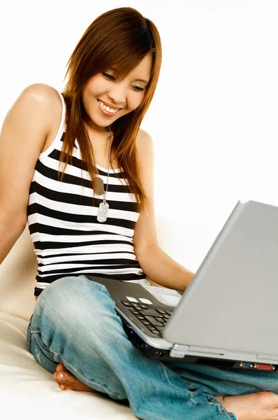 Asian girl with laptop — Stock Photo, Image