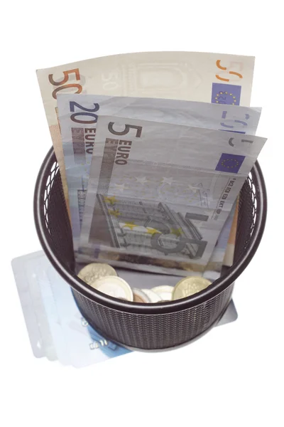 Trash with banknotes as metaphor — Stock Photo, Image